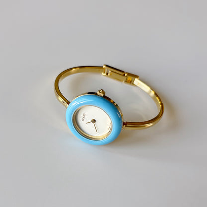 Gucci 1990s Interchangeable Bezel Gold Plated Bangle Watch with 12 bezels, case (Small)