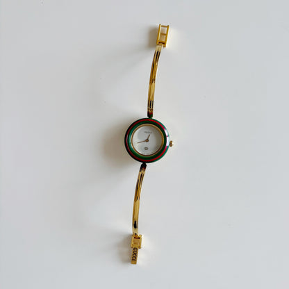 Gucci 1990s Interchangeable Bezel Gold Plated Watch with 12 bezels, case (Small)