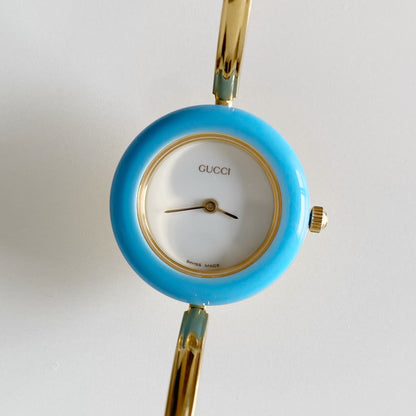 Gucci 1990s Interchangeable Bezel Gold Plated Bangle Watch with 12 bezels, case