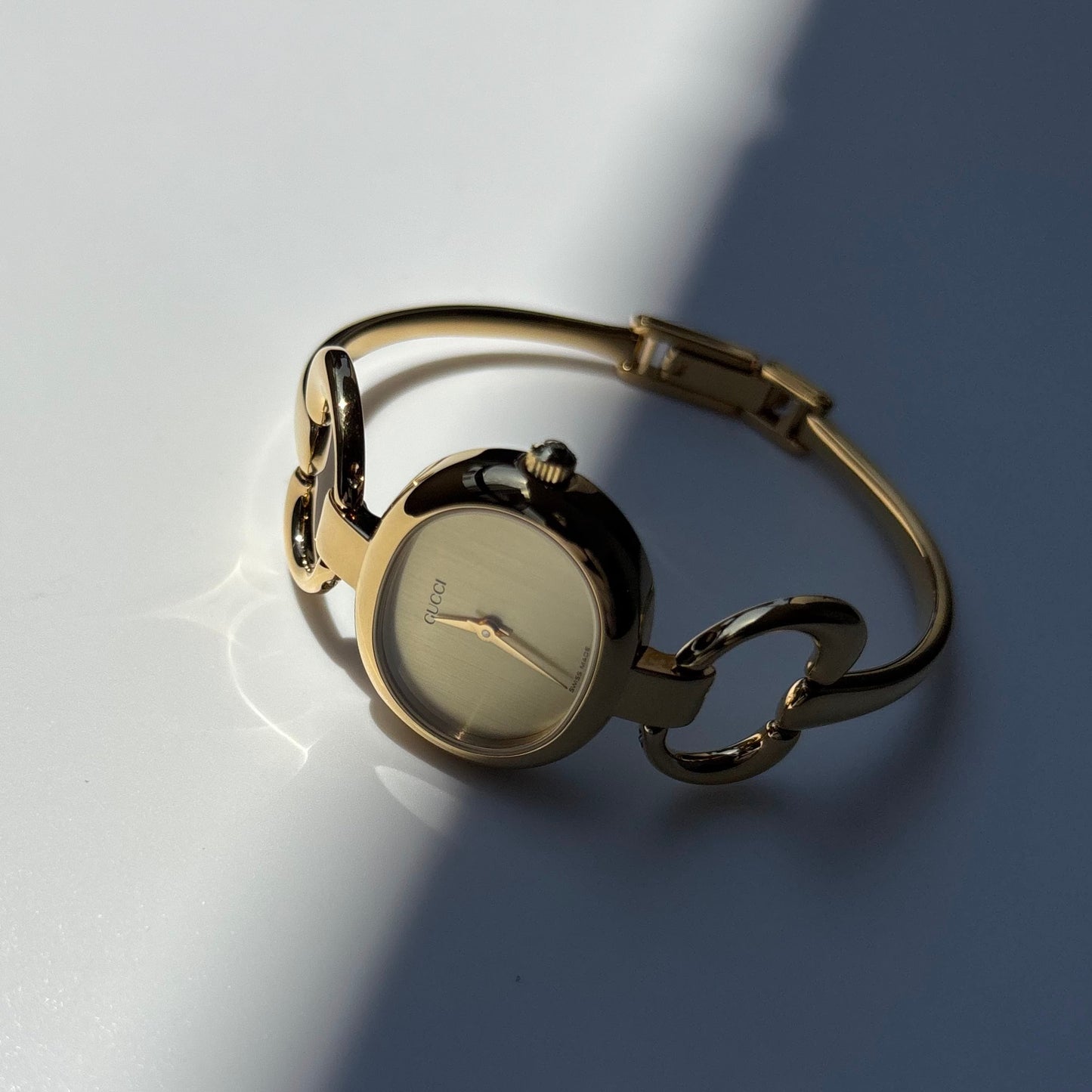 Gucci 1990s Oval Dial Gold Plated Bangle Watch