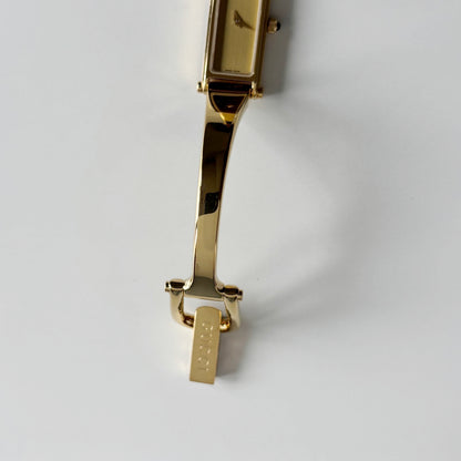 Gucci 1990s Gold Rectangular Dial Gold Plated Bangle Watch