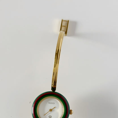 Gucci 1990s Interchangeable Bezel Gold Plated Bangle Watch with 12 bezels, case