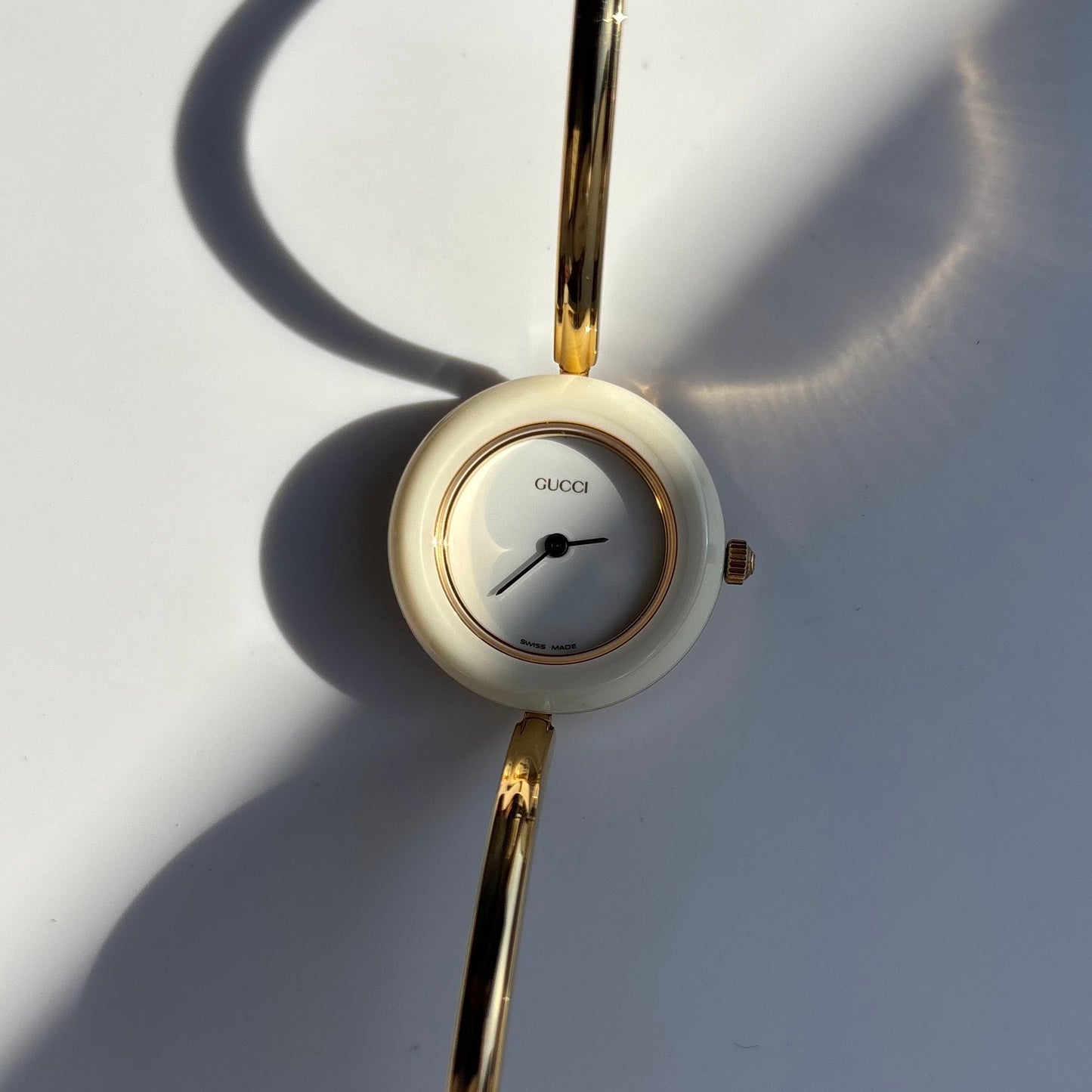 Gucci 1990s Interchangeable Bezel Gold Plated Bangle Watch with 12 bezels, case