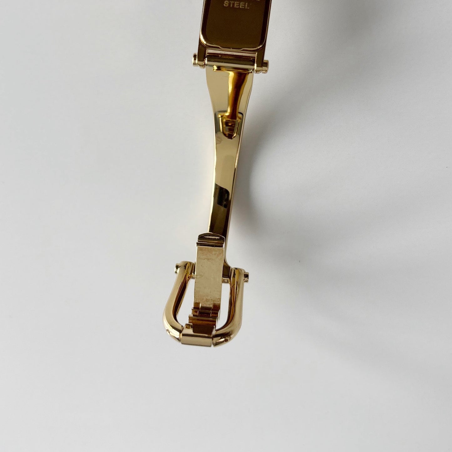 Gucci 1990s Gold Rectangular Dial Gold Plated Bangle Watch