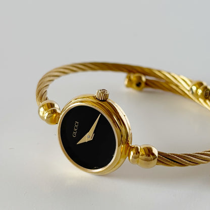 Gucci 1990s Black Dial Gold Plated Cable Bangle Watch