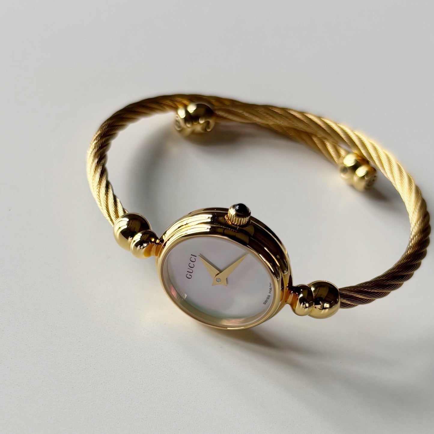 Gucci 1990s Seashell Dial Gold Plated Cable Bangle Watch