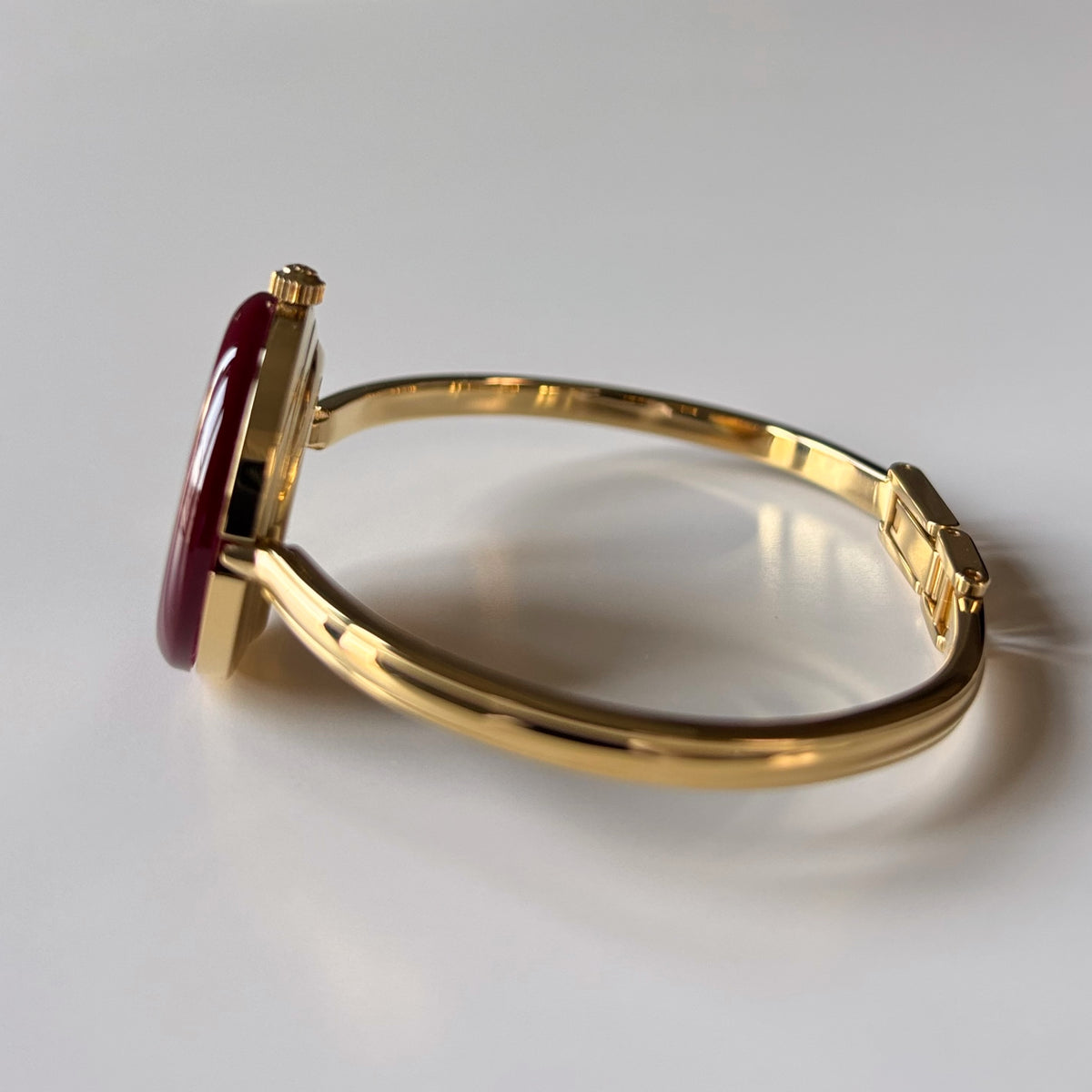 Gucci 1990s Interchangeable Bezel Gold Plated Bangle Watch with 12 bezels, case