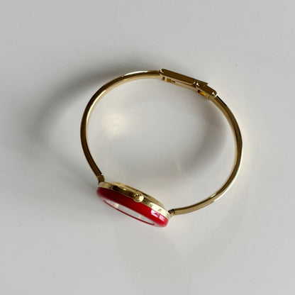 Gucci 1990s Interchangeable Bezel Gold Plated Bangle Watch with case, 12 bezels (Small)