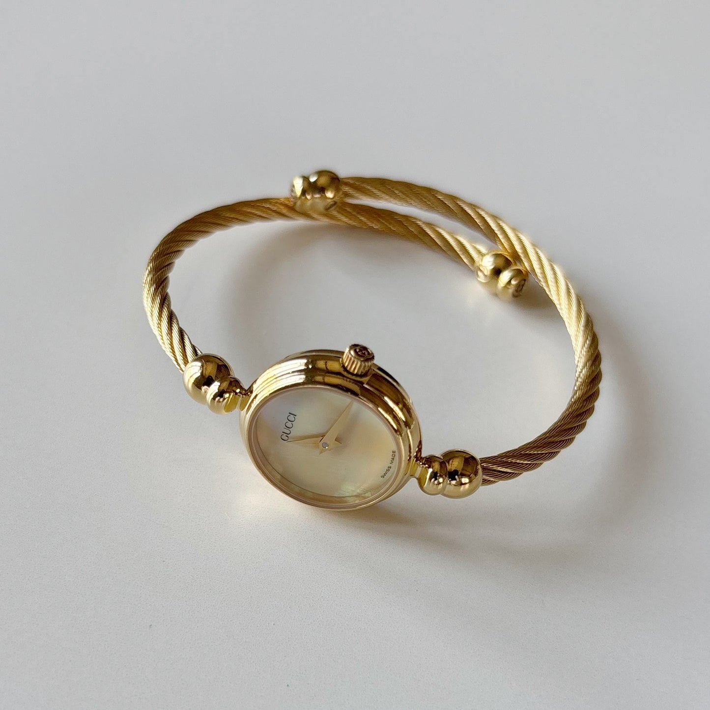 Gucci 1990s Seashell Dial Gold Plated Cable Bangle Watch
