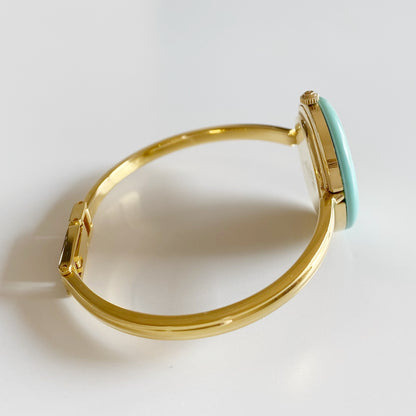 Gucci 1990s Interchangeable Bezel Gold Plated Bangle Watch with 12 bezels, case
