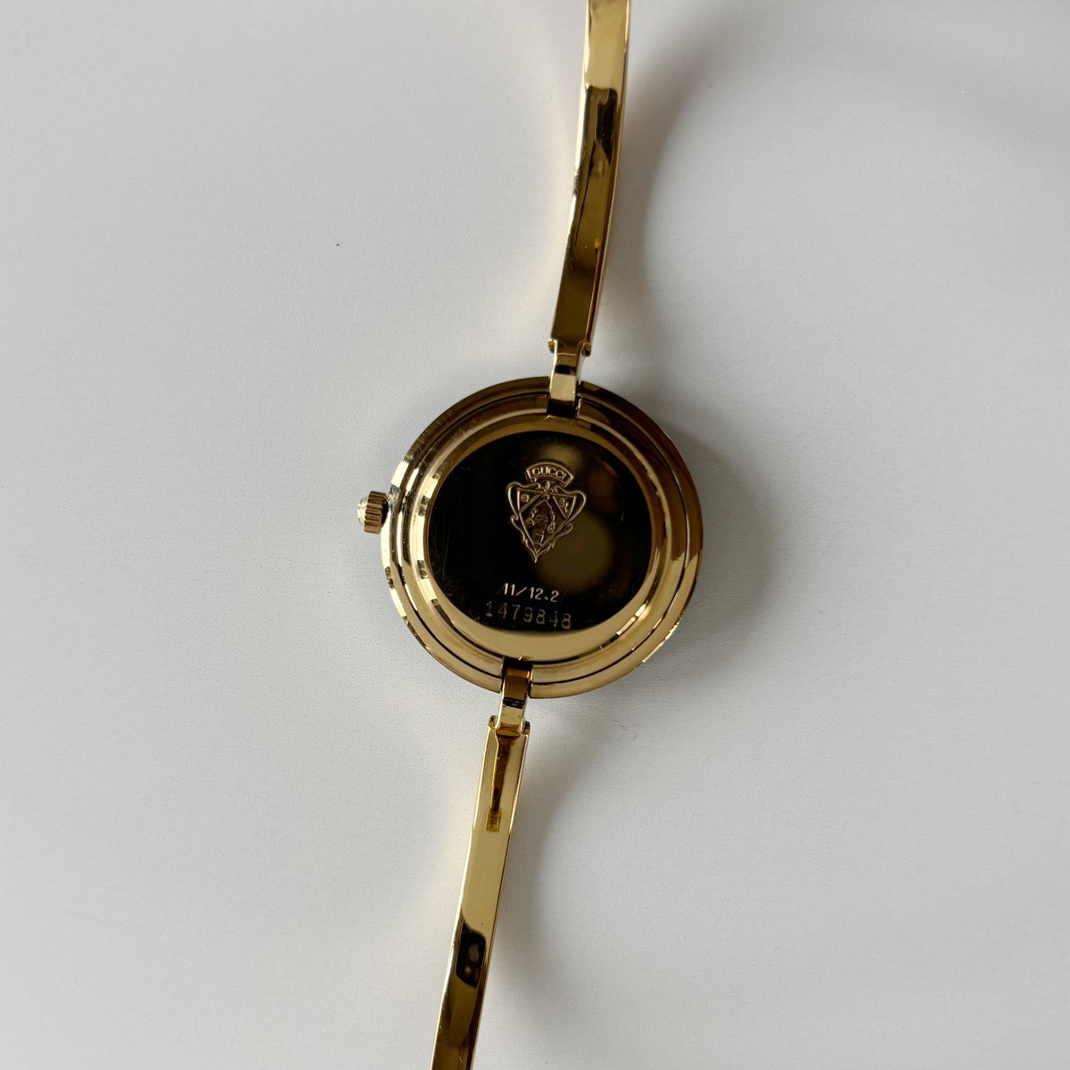 Gucci 1990s Interchangeable Bezel Gold Plated Bangle Watch with 12 bezels, case