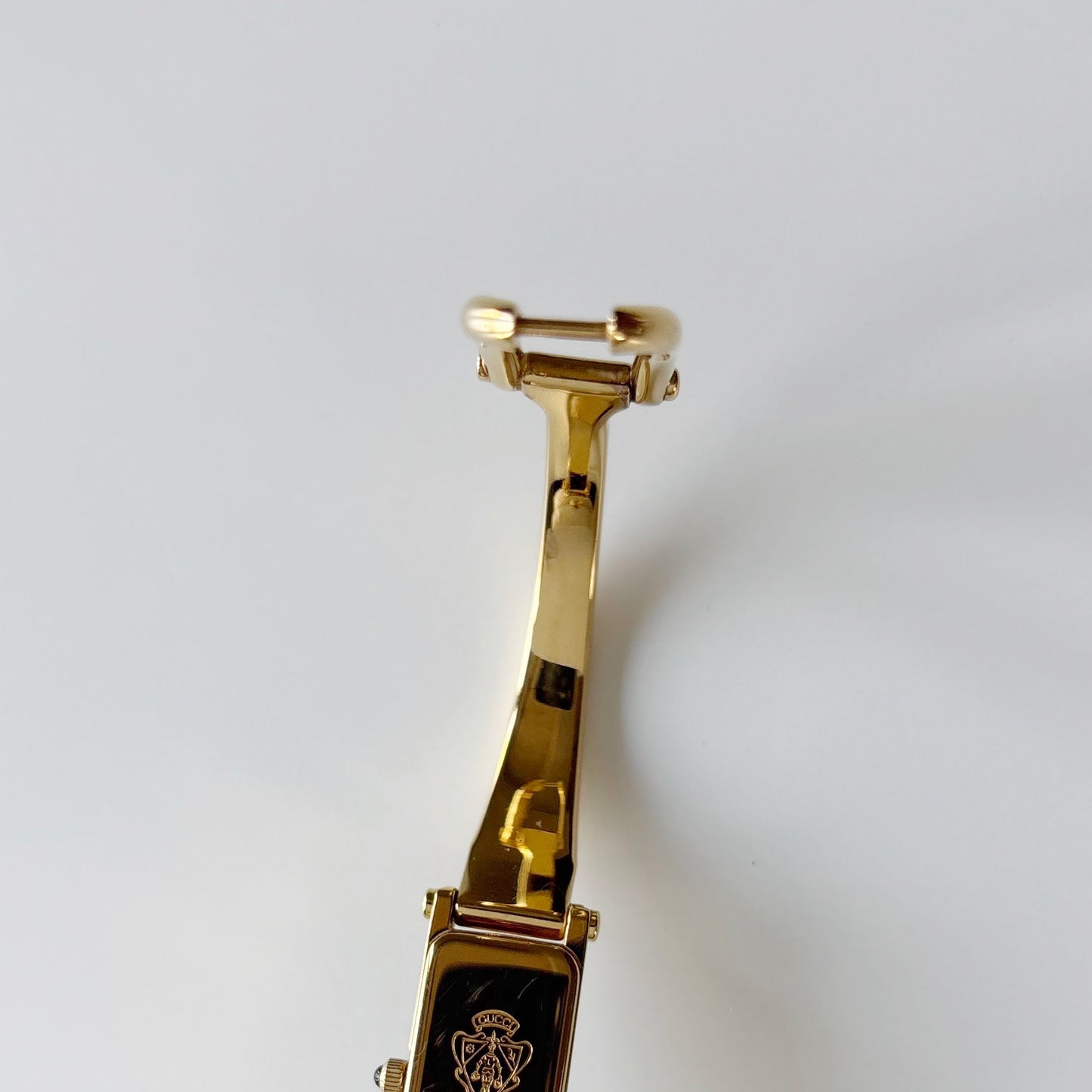 Gucci 1990s Black Dial Gold Plated Bangle Watch