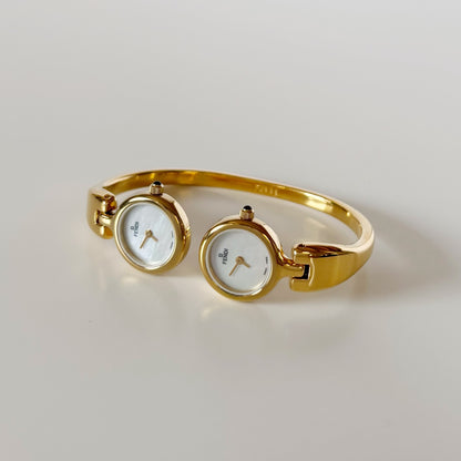 Fendi 1990s Seashell Dial Two Time Zone Gold Plated Bangle Watch