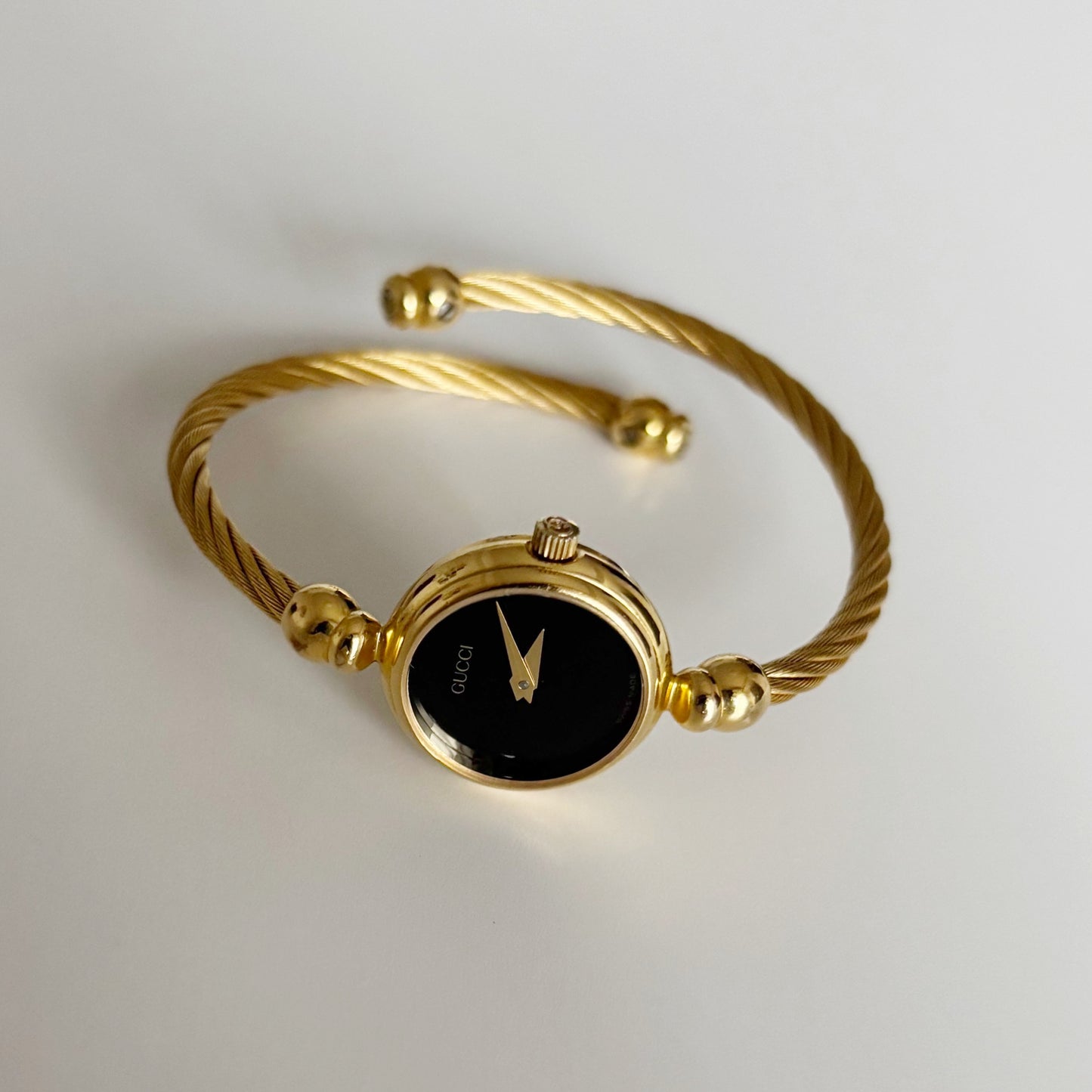 Gucci 1990s Black Dial Gold Plated Cable Bangle Watch