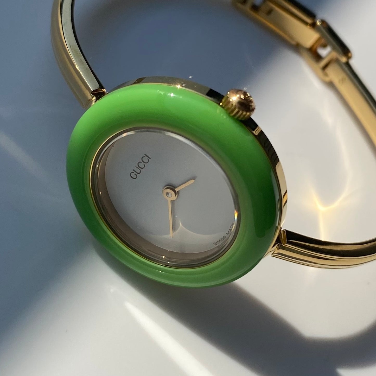 Gucci 1990s Interchangeable Bezel Gold Plated Bangle Watch with 12 bezels, case (Small)