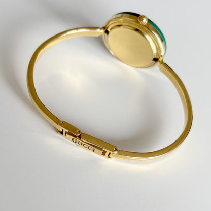 Gucci 1990s Interchangeable Bezel Gold Plated Bangle Watch with 12 bezels, case