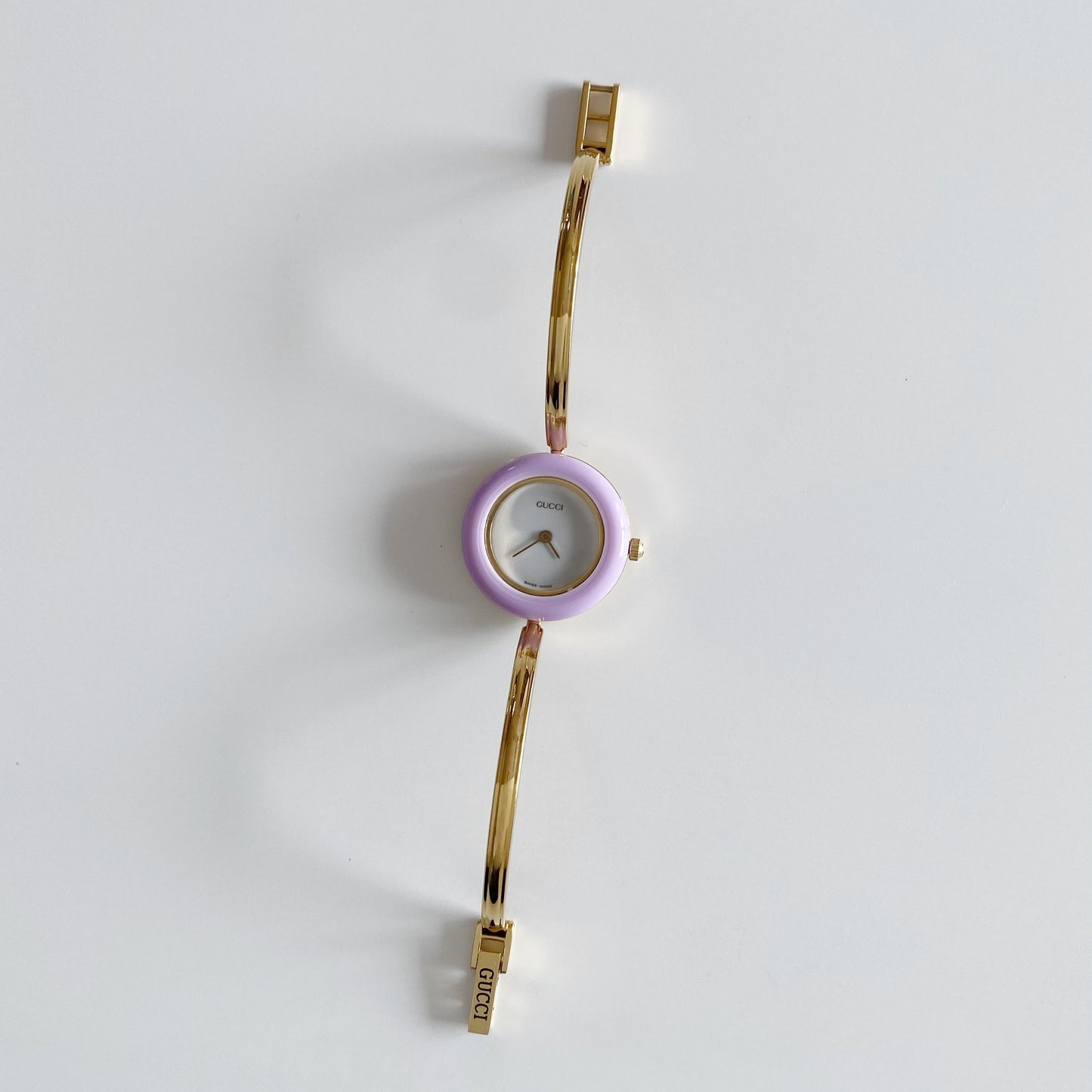 Gucci 1990s Interchangeable Bezel Gold Plated Bangle Watch with 12 bezels, case