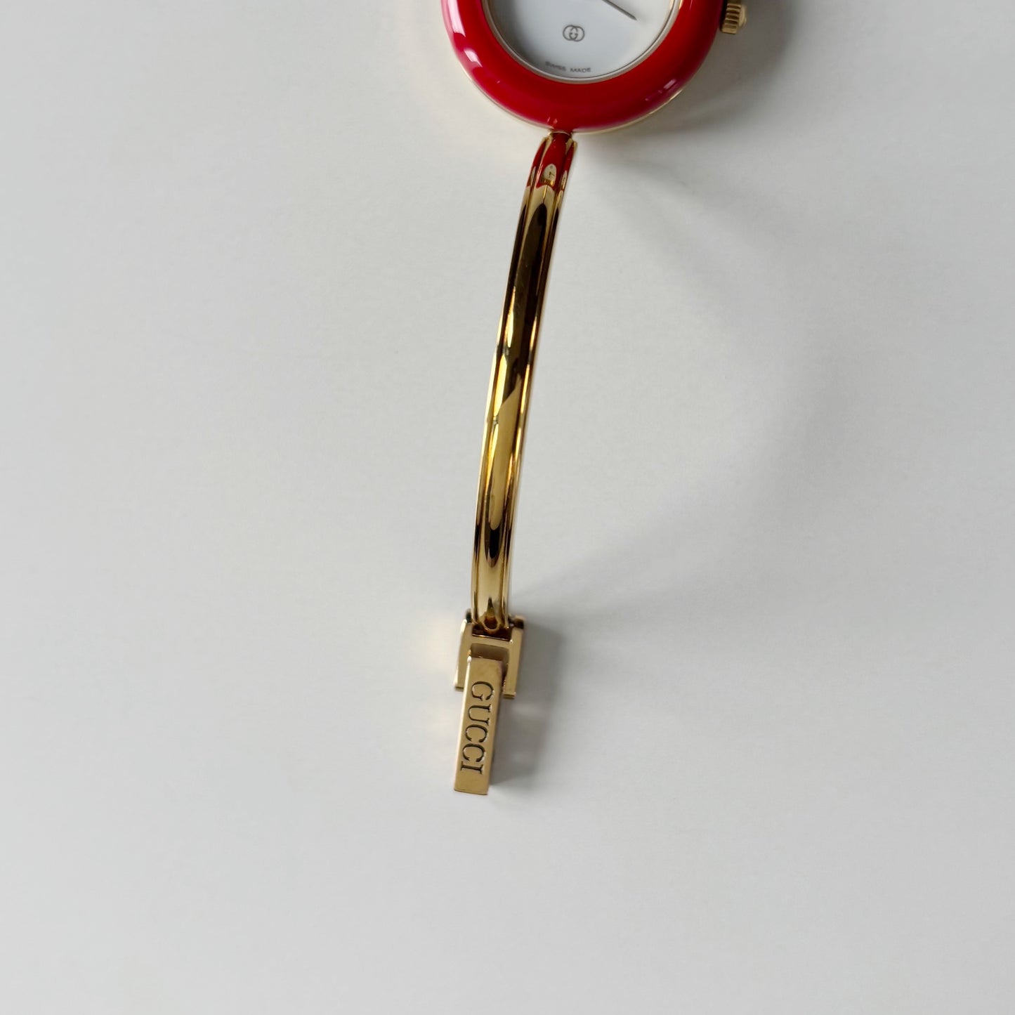 Gucci 1990s Interchangeable Bezel Gold Plated Bangle Watch with 12 bezels, case