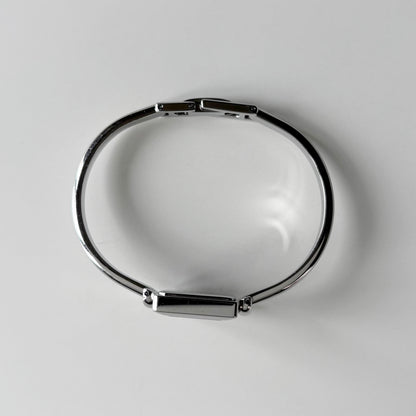 Gucci 1990s Square Dial Silver Bangle Watch