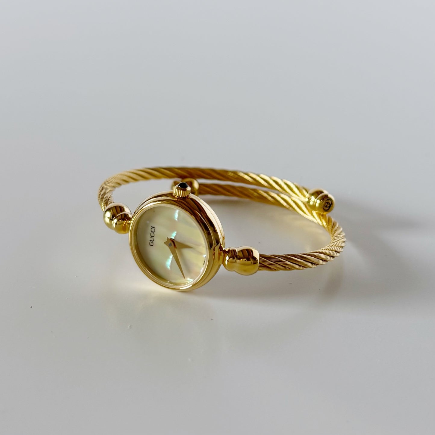 Gucci 1990s Seashell Dial Gold Plated Cable Bangle Watch