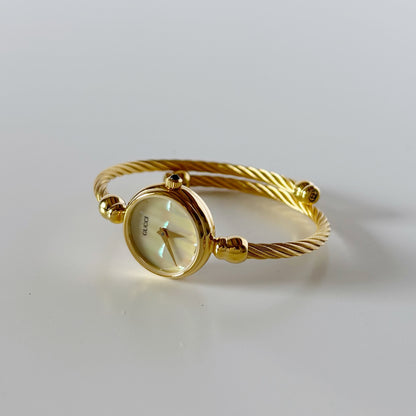 Gucci 1990s Seashell Dial Gold Plated Cable Bangle Watch