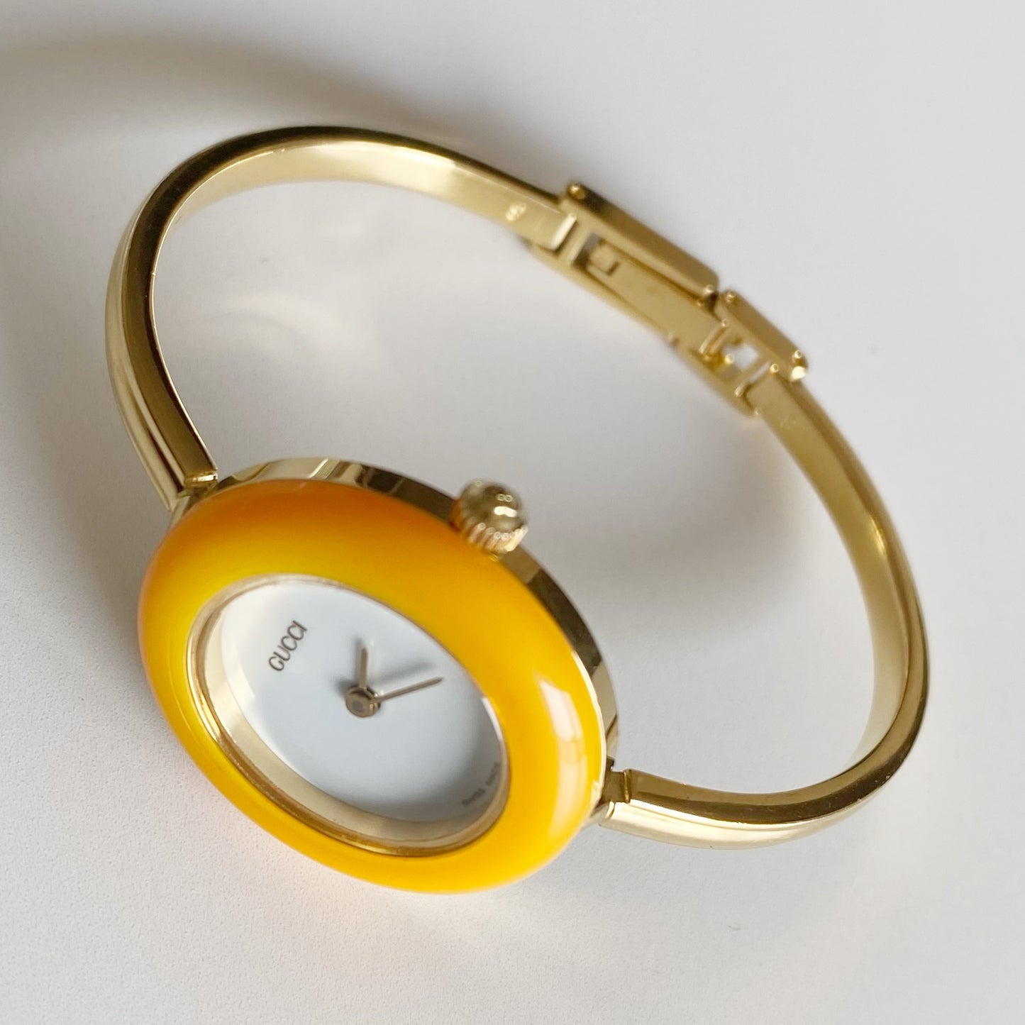 Gucci 1990s Interchangeable Bezel Gold Plated Bangle Watch with 12 bezels, case