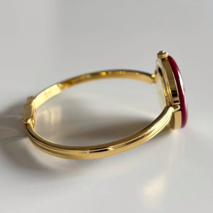 Gucci 1990s Interchangeable Bezel Gold Plated Bangle Watch with 12 bezels, case