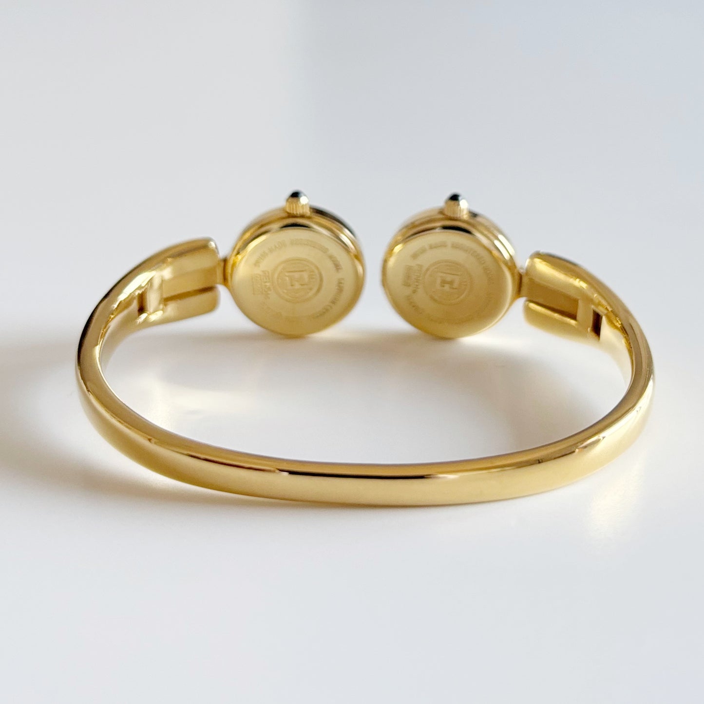 Fendi 1990s Seashell Dial Two Time Zone Gold Plated Bangle Watch