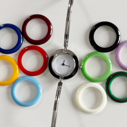 Gucci 1990s Interchangeable Bezel Stainless steel Bangle Watch with 12 bezels, case