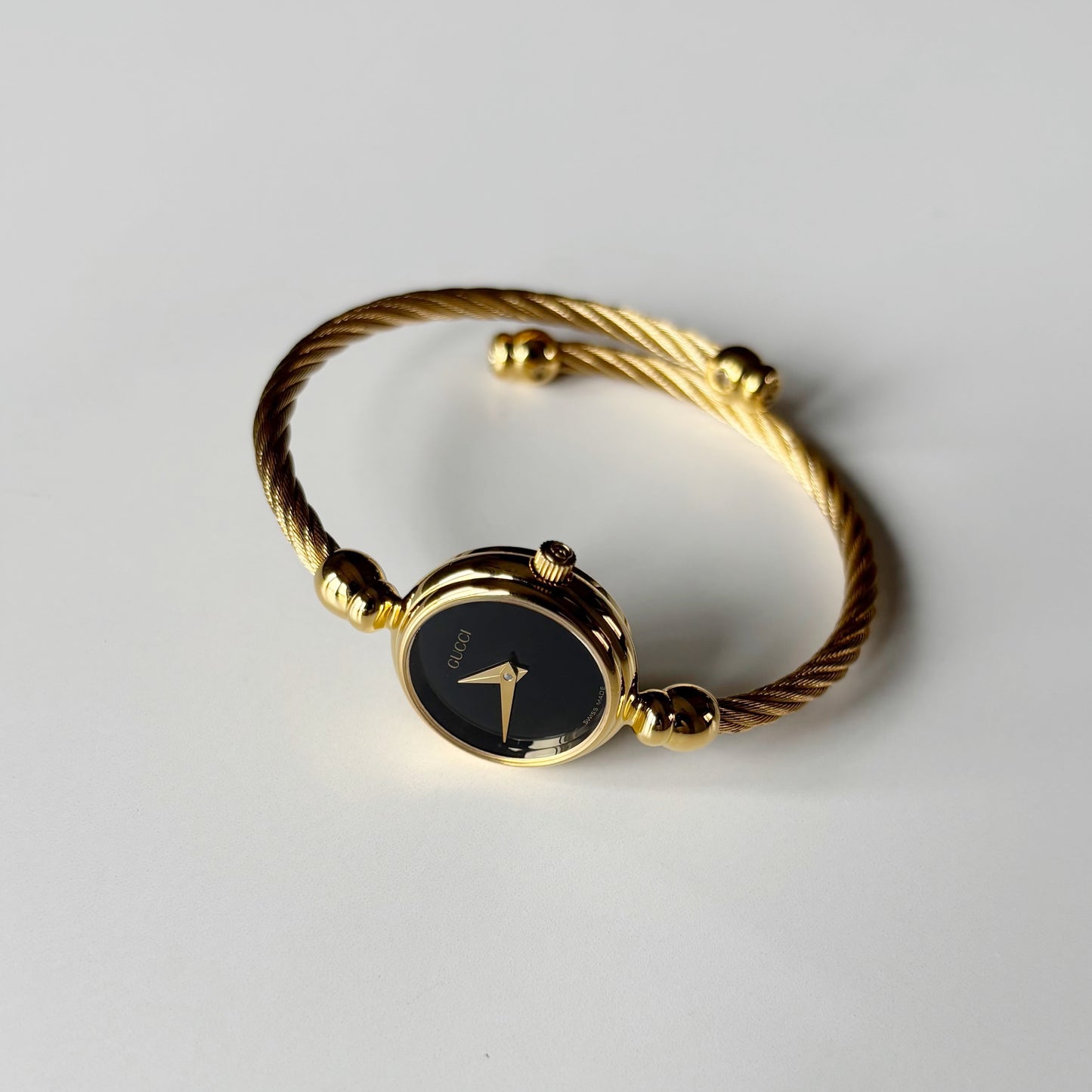 Gucci 1990s Black Dial Gold Plated Cable Bangle Watch