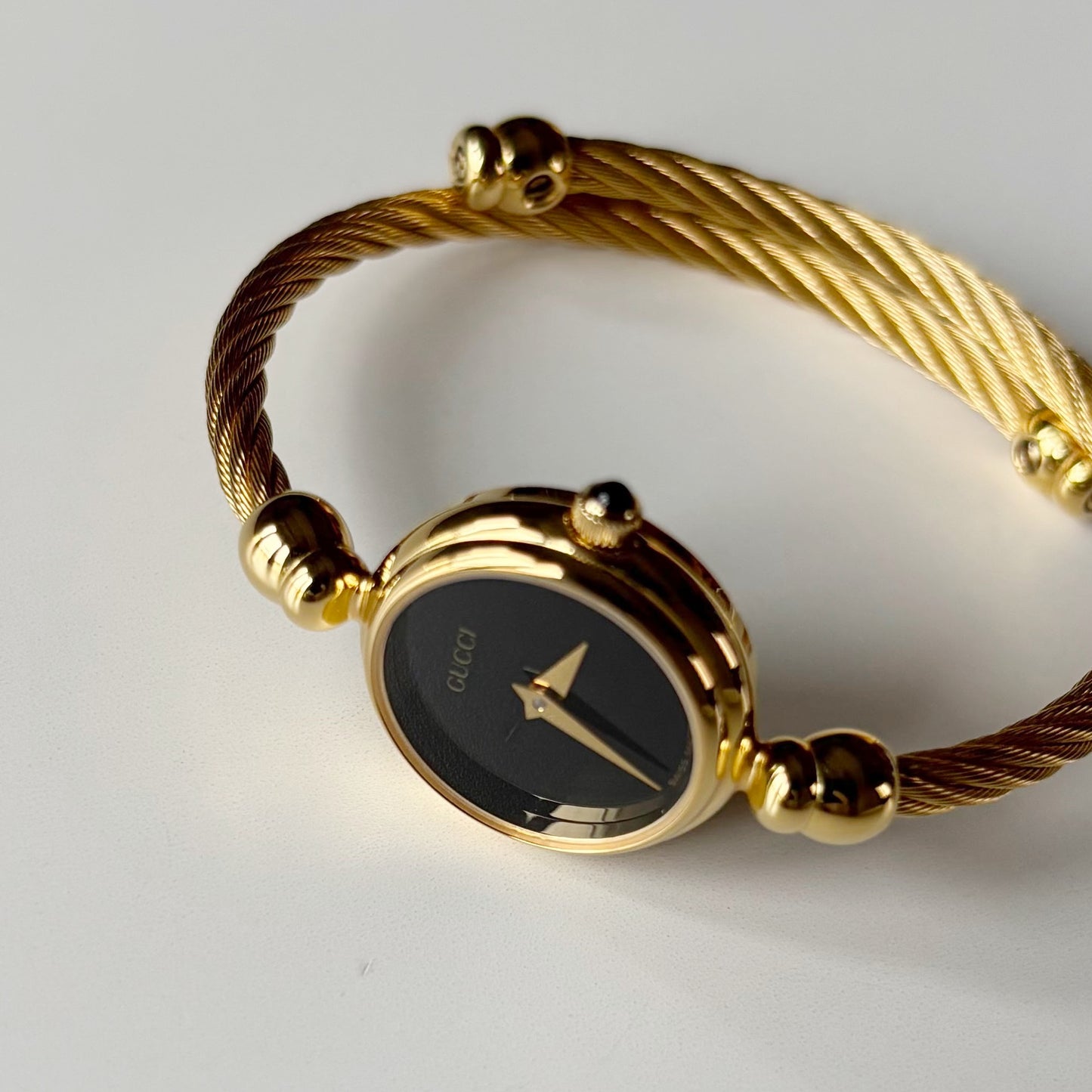 Gucci 1990s Black Dial Gold Plated Cable Bangle Watch