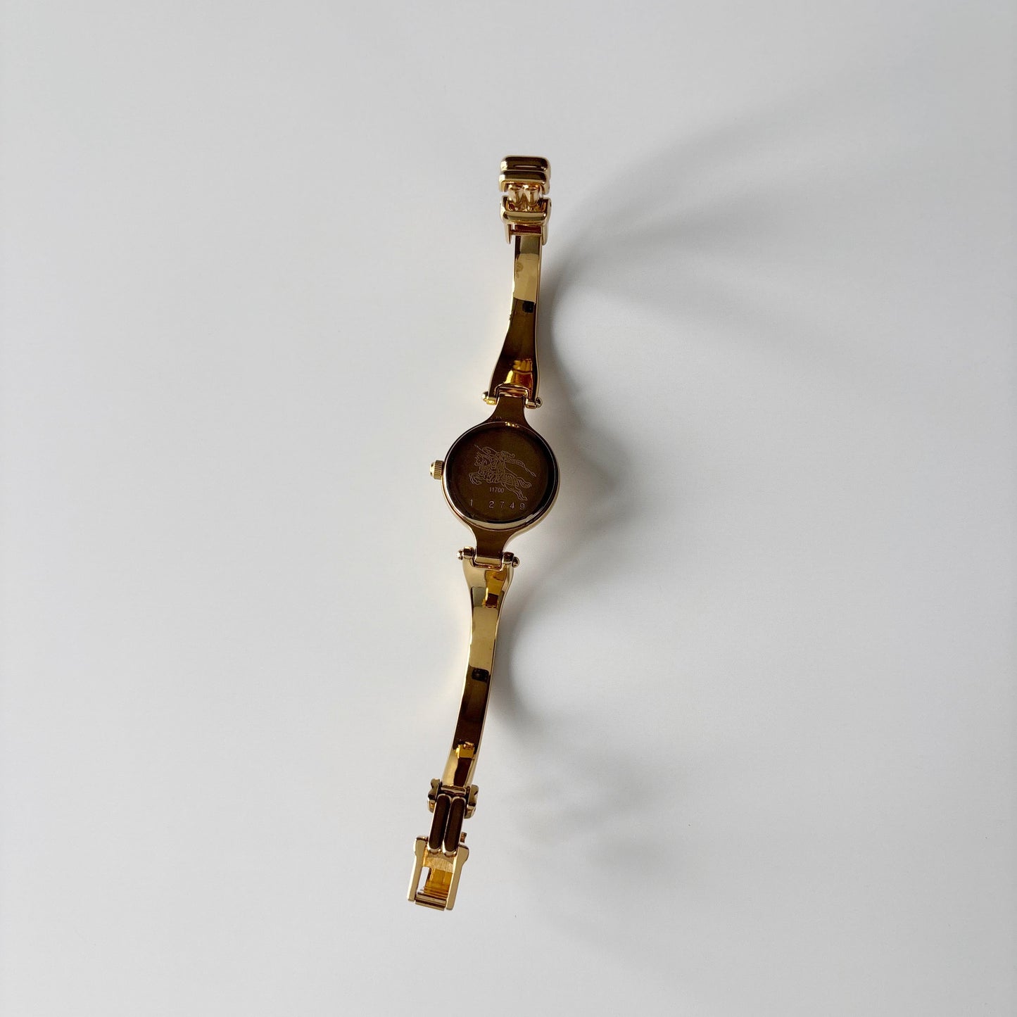 Burberry 1990s Round Dial Gold Plated Bangle Watch