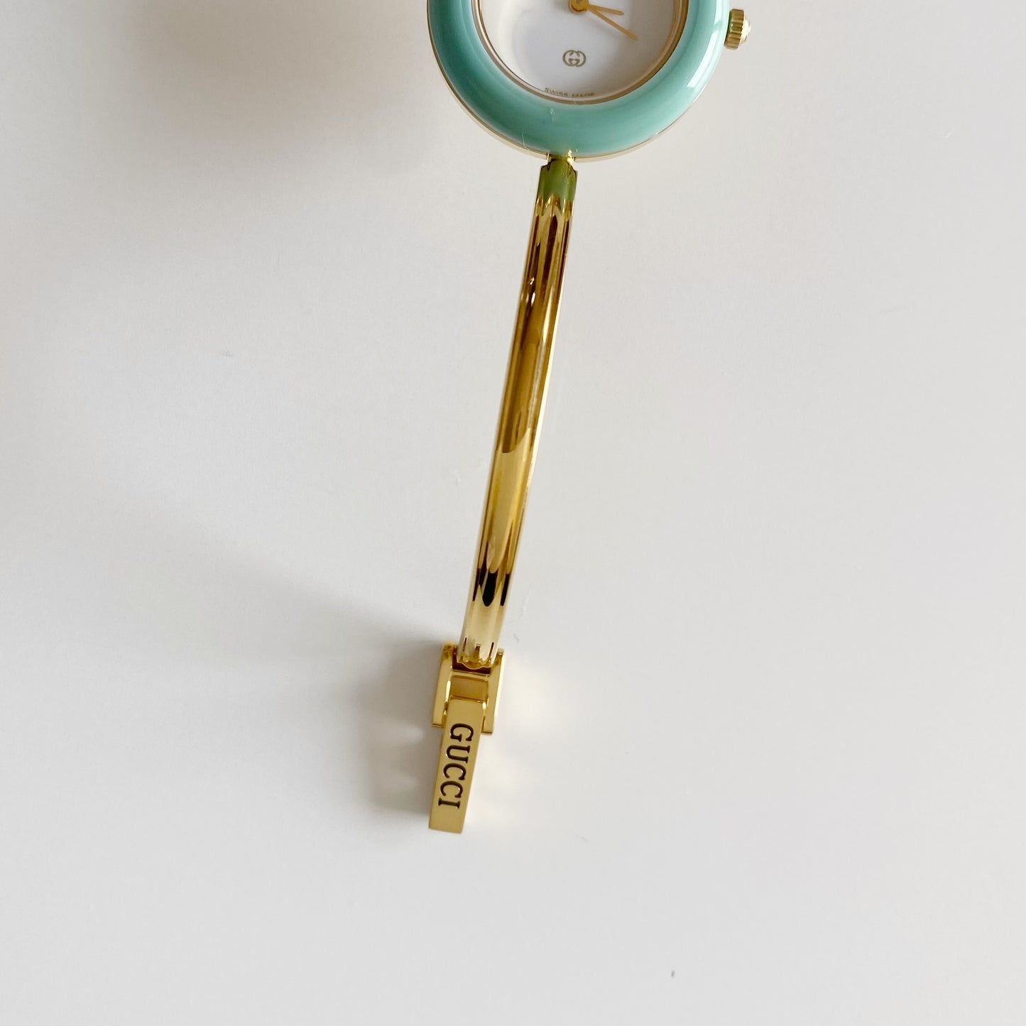 Gucci 1990s Interchangeable Bezel Gold Plated Bangle Watch with 12 bezels, case