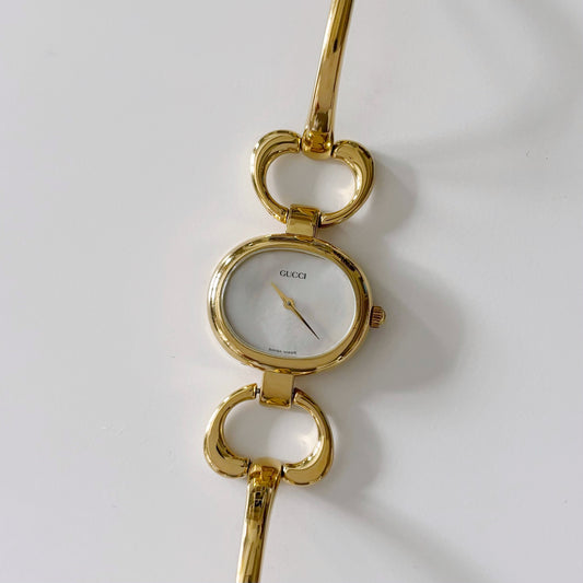 Gucci 1990s Seashell Dial Gold Plated Bangle Watch