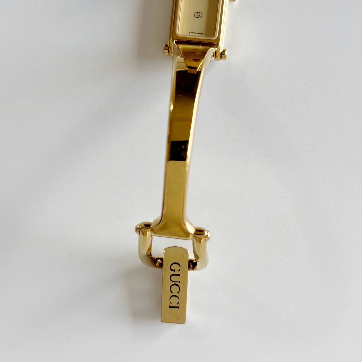 Gucci 1980s Rectangular Gold Dial Gold Plated Bangle Watch