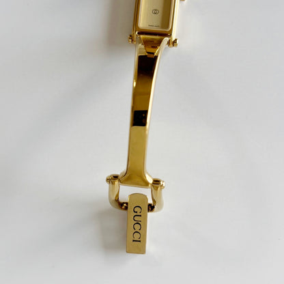 Gucci 1980s Rectangular Gold Dial Gold Plated Bangle Watch