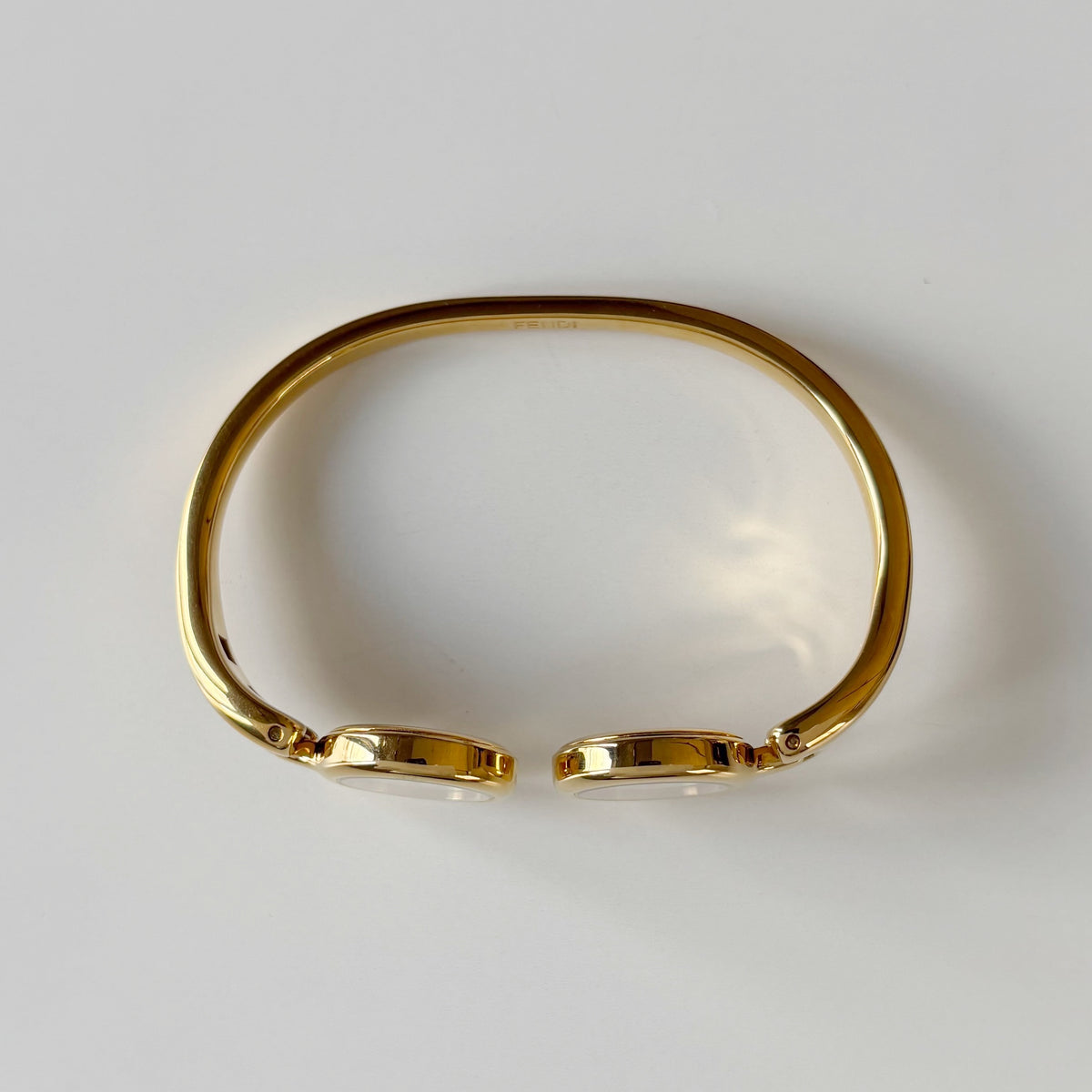 Fendi 1990s Seashell Dial Two Time Zone Gold Plated Bangle Watch