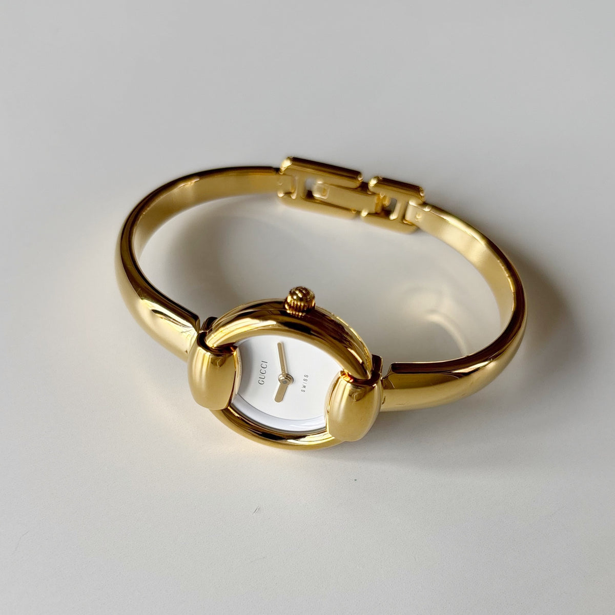 Gucci Round Dial Gold-Plated Bangle Watch