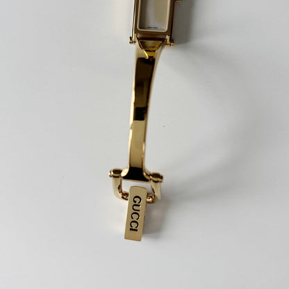 Gucci 1990s Seashell Rectangular Dial Gold Plated Bangle Watch