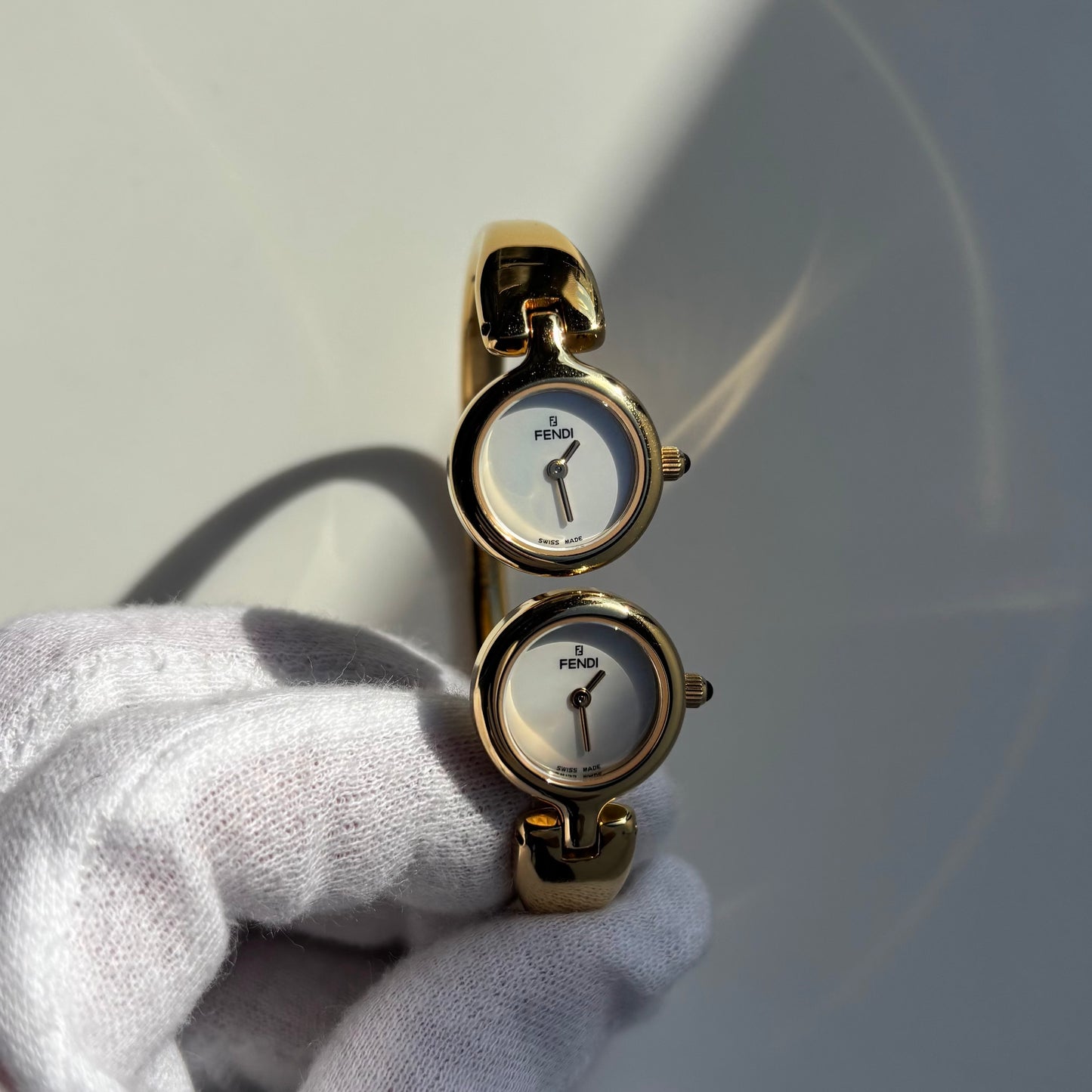 Fendi 1990s Seashell Dial Two Time Zone Gold Plated Bangle Watch