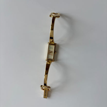 Gucci 1990s Seashell Dial Gold Plated Bangle Watch