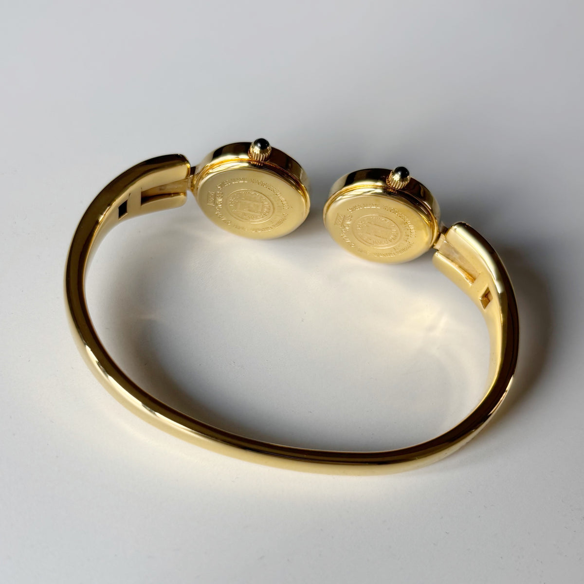 Fendi 1990s Seashell Dial Two Time Zone Gold Plated Bangle Watch