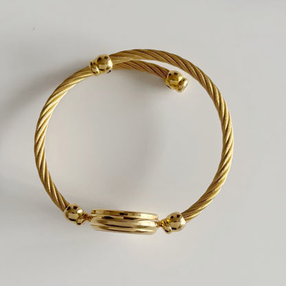 Gucci 1990s Black Dial Gold Plated Cable Bangle Watch