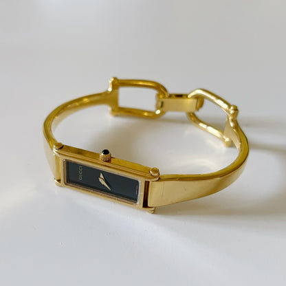 Gucci 1990s Black Dial Gold Plated Rectangular Bangle Watch