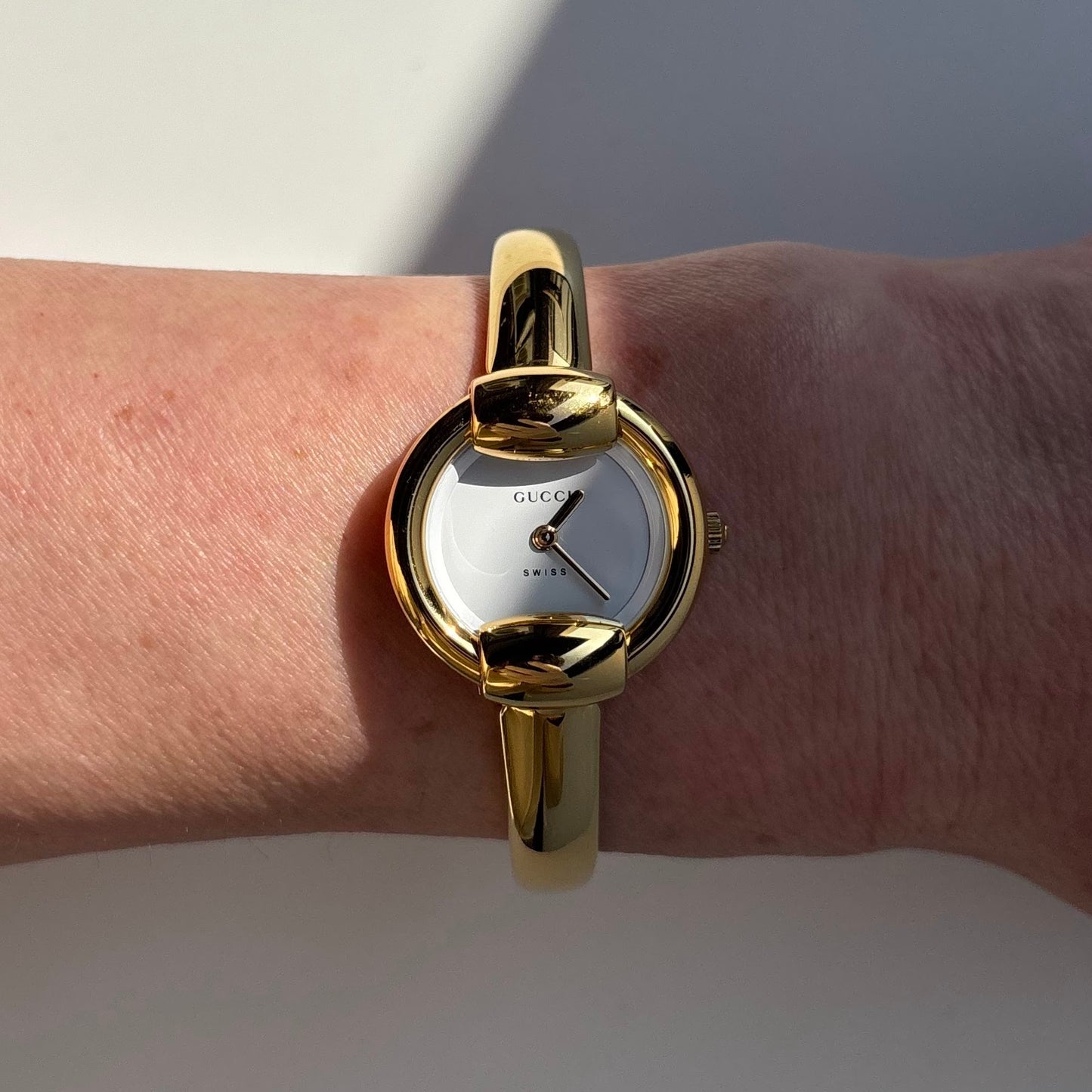Gucci 1990s Round Dial Gold Plated Bangle Watch (Small)