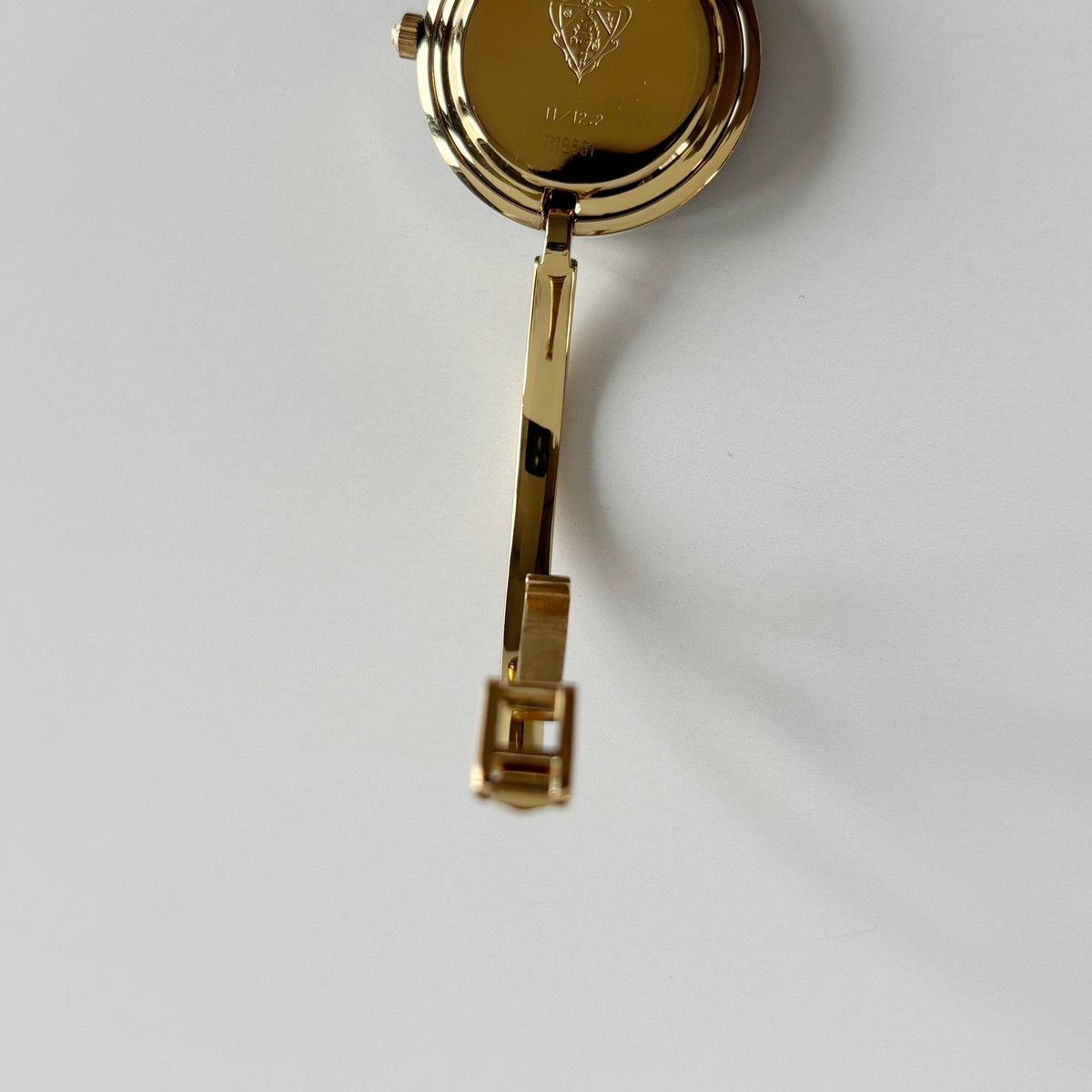 Gucci 1990s Interchangeable Bezel Gold Plated Bangle Watch with 12 bezels, case
