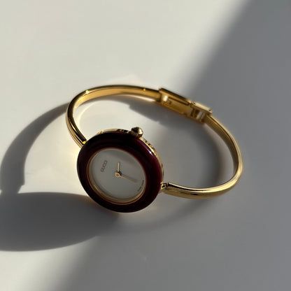 Gucci 1990s Interchangeable Bezel Gold Plated Bangle Watch with 12 bezels, case