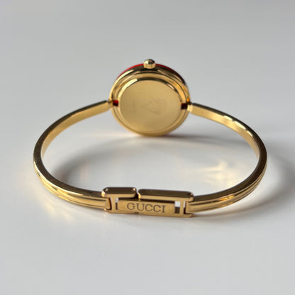 Gucci 1990s Interchangeable Bezel Gold Plated Bangle Watch with 12 bezels, case