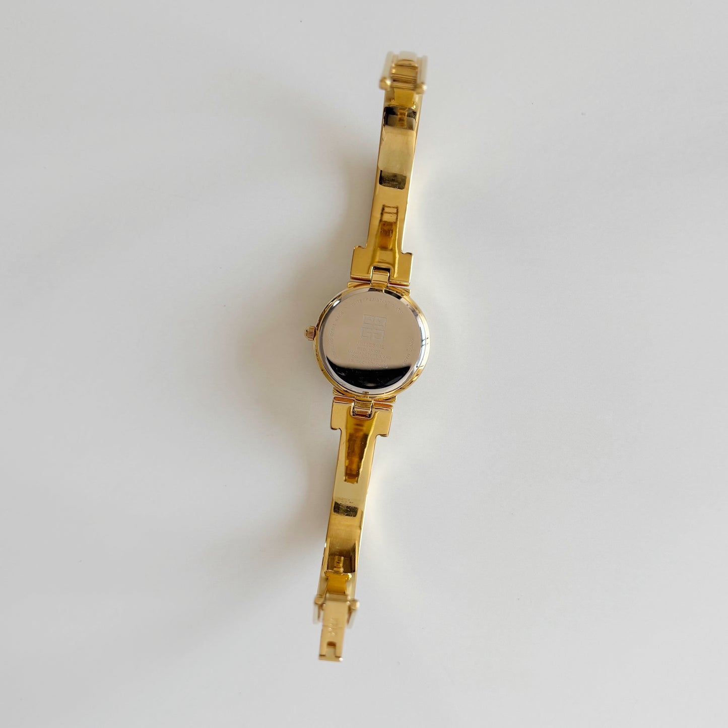 Givenchy 1990s Navy Round Dial Gold Plated Bangle Watch