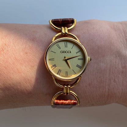 Gucci 1990s Gold Plated Round Dial Horsebit Watch